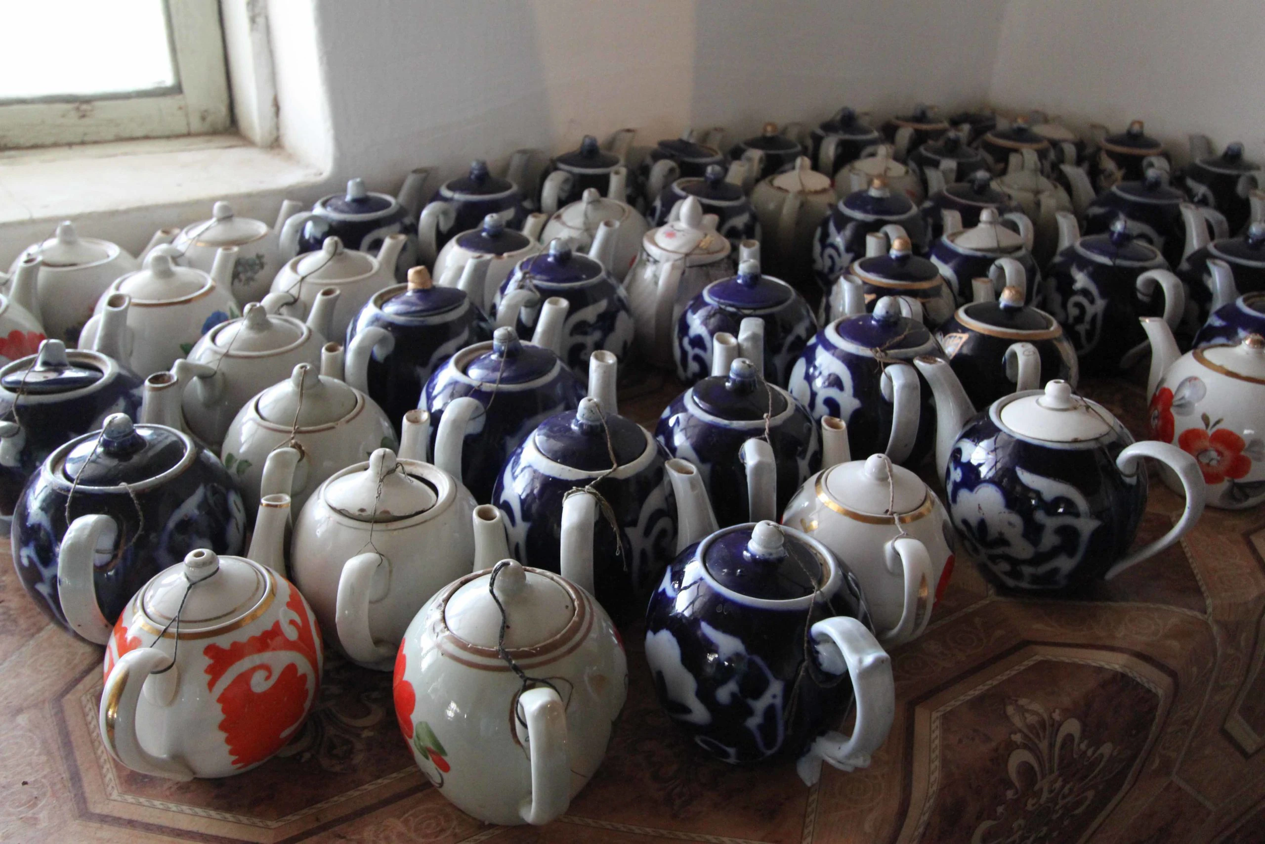 Tea pots, a Photograph by Mary O'Connor
